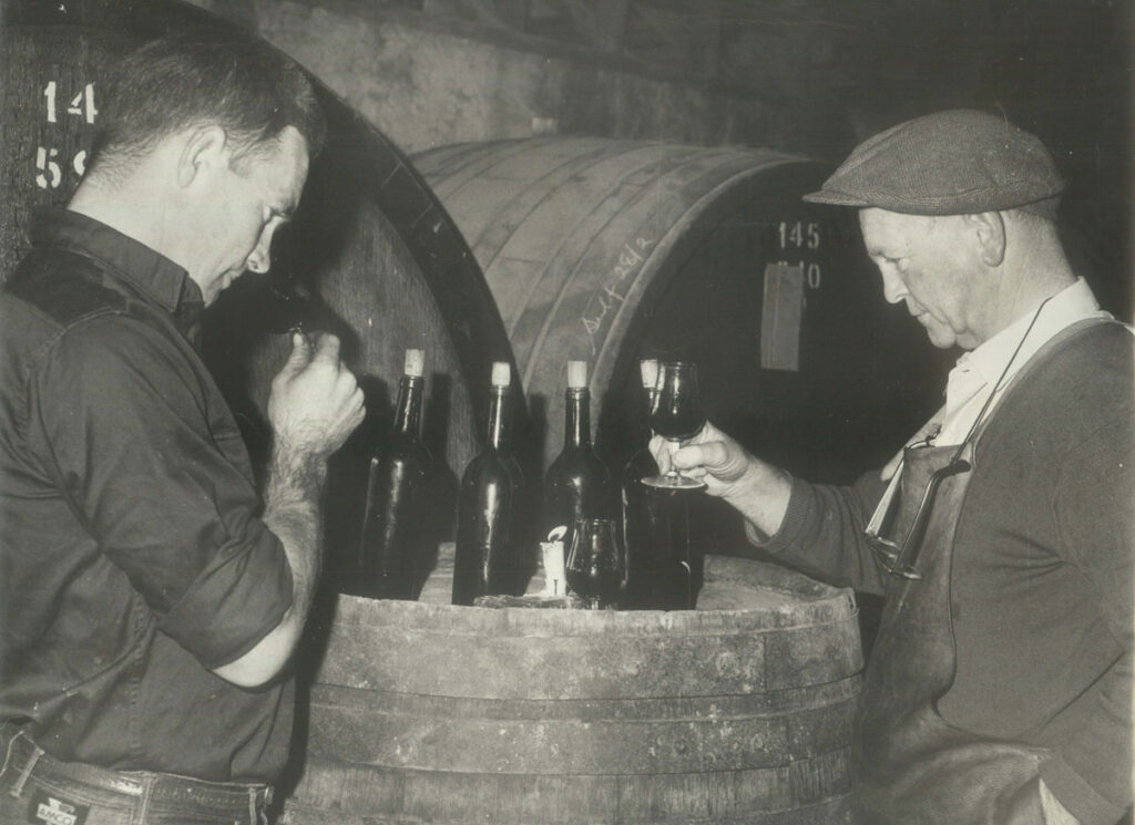 Eric and Viv tasting wine in the cellar